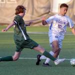 KEITH THORPE/PENINSULA DAILY NEWS Sequims Mekhi Ashby, right, fends off Port Angeles Grant Butterworth on Tuesday evening at Peninsula College.