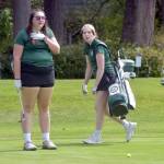 KEITH THORPE/PENINSULA DAILY NEWS Port Angeles Mia Neff, left, and Claire Osterberg of Port Angeles plan their putts on the 11th Hole at Peninsula Golf Course during Tuesdays Duke Streeter Invitational.