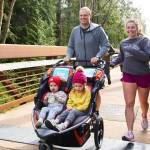 Jeremy and Jessie Gilchrist of Port Angeles take off in the 2023 edition of the Sequim Railroad Bridge Run, part of the Run the Peninsula series. (Matt Sagen/Cascadia Films)