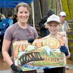 Laura Gould and her daughter Eleanor Jones celebrate their double win the womens 5K and 10K races Saturday at the Sequim Railroad Bridge Run. (Michael Dashiell/Olympic Peninsula News Group)