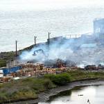 Smoke rises on Tuesday morning from the site of a baled cardboard fire that broke out late Monday night at the McKinley Paper Company on Marine Drive in Port Angeles. (Keith Thorpe/Peninsula Daily News)