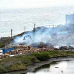Smoke rises on Tuesday morning from the site of a baled cardboard fire that broke out late Monday night at the McKinley Paper Company on Marine Drive in Port Angeles. (Keith Thorpe/Peninsula Daily News)
