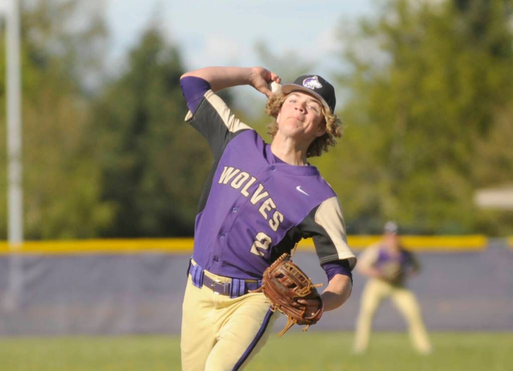 Sequims Zeke Schmadeke pitches against Olympic in an added tiebreaker game played Tuesday in Sequim. (Michael Dashiell/Olympic Peninsula News Group)