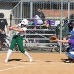 Heidi Leitz (8) swings for a base hit against North Kitsap on Thursday. The Riders got up 4-0, but North Kitsap went on to win 15-4 to tie Port Angeles for first place. (Dave Logan/for Peninsula Daily News)
