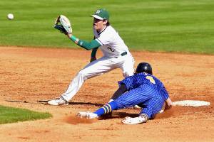 KEITH THORPE/PENINSULA DAILY NEWS
Port Angeles shortstop Alex Angevine, left, receives the throw from home to pick off Fife's Kaden Cretti during Tuesday's playoff game at Port Angeles Civic Field.