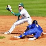 Port Angeles shortstop Alex Angevine, left, receives the throw from catcher Luke Flodstrom to nail Fifes Kaden Cretti trying to steal second base during Tuesdays playoff game at Port Angeles Civic Field. (KEITH THORPE /PENINSULA DAILY NEWS)
