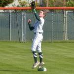 KEITH THORPE/PENINSULA DAILY NEWS Port Angeles centerfielder Nathan Basden catches a high popup during Tuesdays playoff against Fife in Port Angeles.