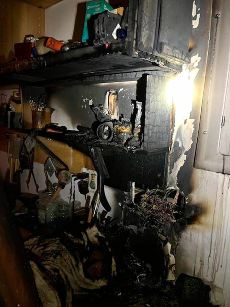 A fire inside a detached shop on Wednesday on Shore Road was contained to a small area, fire officials said. (Chris Turner/Clallam County Fire District 3)