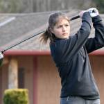 Sequims Raimey Brewer qualified for the 2A state girls golf tournament. Here, she is competing earlier in the season against Bainbridge. (Michael Dashiell/Olympic Peninsula News Group)