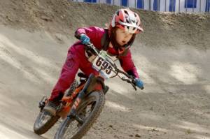 Elon Gromyko of Lynnwood races in the boys' 7 and under category at the second Northwest Cup race in Port Angeles on Sunday. in the U7 men’s category. More than 500 riders from several states and Canadian provinces competed in the three days of downhill racing this weekend. (Dave Logan/for Peninsula Daily News)