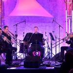 Members of Valhalla Brass, from left, Scott Meredith, Wade Demmert, Bake Yarbrough, Leland Matumura and Gabriel Palmer perform on Saturday on the Main Stage at Vern Burton Community Center on Saturday at the Juan de Fuca Festival of the Arts. (Keith Thorpe/Peninsula Daily News)