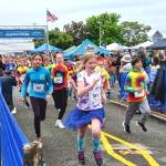 Local kids from preschool to sixth grade take off in the kids marathon at Port Angeles City Pier on Saturday afternoon as part of the North Olympic Discovery Marathon festivities. (Pierre LaBossiere/Peninsula Daily News)
