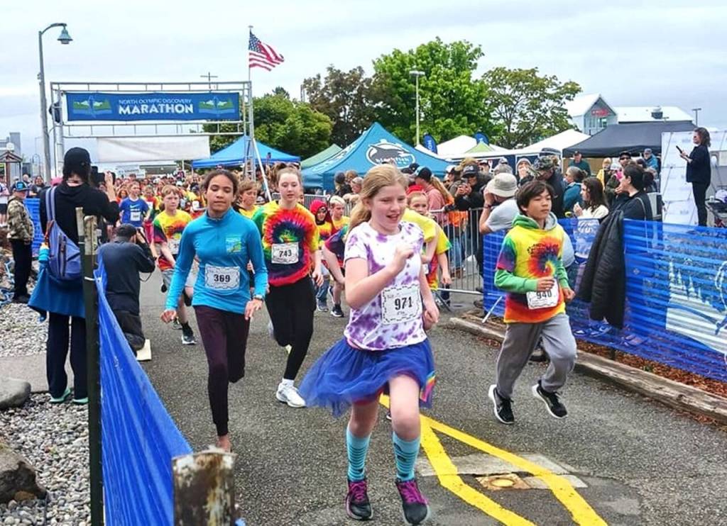 Local kids from preschool to sixth grade take off in the kids marathon at Port Angeles City Pier on Saturday afternoon as part of the North Olympic Discovery Marathon festivities. (Pierre LaBossiere/Peninsula Daily News)