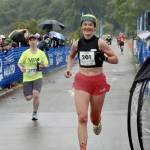 Natasha Parsons of Nanaimo, B.C., right, wins the womens marathon in the NODM marathon Sunday morning. Wet weather and a lack of wind made for fast times as Parsons won in 3:01:5.31. (Dave Logan/for Peninsula Daily News)