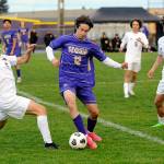 Michael Dashiell/Olympic Peninsula News Group
Sequim's Josh Alcarez, center, avoids two Bainbridge defenders during a March contest. Alcarez was selected to the All-Olympic League first team in voting conducted by league coaches.
