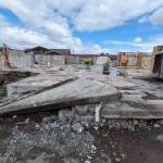 Workers with Hoch Construction remove much of the structure at the Sequim Library location, 630 N. Sequim Ave., in preparation for the major expansion project. (Noah Glaude/North Olympic Library System)