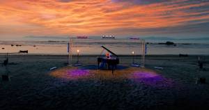 For her Oceans music video, Jennifer Thomas, her husband Will and son Preston set up a grand piano and light display at Bullman Beach in Sekiu. (Jennifer Thomas)