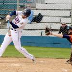 Wilder Seniors Ezra Townsend takes a big cut at a pitch against Whatcom Post No. 7 on Sunday. (Dave Logan/for Peninsula Daily News)