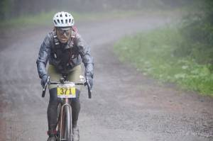 Chris DuBois battles the elements on the road during Saturdays Gravel Unravel in the mountains northwest of Quilcene. DuBois, of Seattle, raced on the 55-mile-long course. (Dan James/Peninsula Adventure Sports)