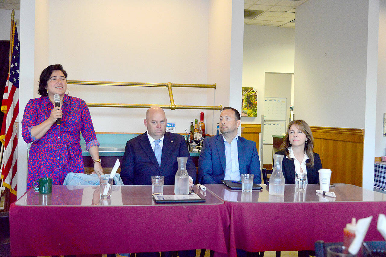 From left to right, State Sen. Emily Randall, D-Bremerton, state Sen. Drew MacEwen, R-Union, Port Angeles attorney Graham Ralston and Commissioner of Public Lands Hilary Franz, all candidates for Washingtons 6th Congressional District, appear before the Port Angeles Business Association on Tuesday to answer questions about their priorities for serving in Congress. (Peter Segall/Peninsula Daily News)
