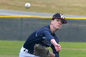 KEITH THORPE/PENINSULA DAILY NEWS
Wilder A pitcher Ethan Swenson pitches against the Maple Ridge, B.C. Royals on Saturday at Volunteer Field in Port Angeles.