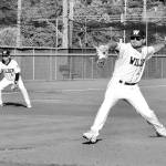 Dave Logan/for Peninsula Daily News
Wilder pitcher Kody Williams winds up to throw in the first inning of Wilder Senior's 10-0 win over Cascade Baseball Club Crush at Civic Field on Thursday. Wilder's Cody Romero backs up the play at third base.