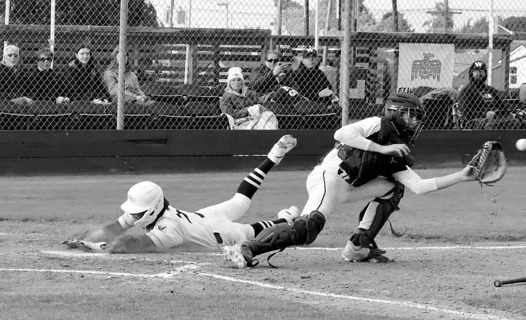 Bryant Laboy

Dave Logan/for Peninsula Daily News
Wilder Senior's Bryant Laboy slides safely home as the throw from the outfield was a bit late to the catcher during Wilder's 10-0 victory over Cascade Baseball Club Crush on Thursday at Civic Field.