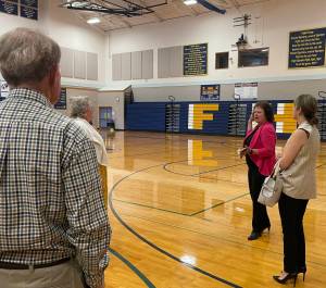 Quillayute Valley School District Superintendent Diana Reaume addresses those on the tour as state Commissioner of Public Lands Hilary Franz, right, looks on. (Christi Baron/Olympic Peninsula News Group)