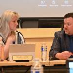 Sequim City Council member Vicki Lowe and Sequim School Board president Eric Pickens talk at a joint meeting at the city councils chambers on June 25. (Michael Dashiell/Olympic Peninsula News Group)