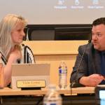 Sequim City Council member Vicki Lowe and Sequim School Board president Eric Pickens talk at a joint meeting at the city councils chambers on June 25. (Michael Dashiell/Olympic Peninsula News Group)