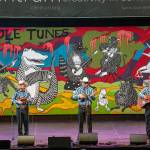 A trio, Canto a Mi Tierra of Veracruz, Mexico, with Osiris Ramses Caballero Leon, left, Bernabe Hernandez Orozco, center, and Fernando Hernandez Orozco, play a set of traditional Mexican music originating in the six states of northeastern Mexico in McCurdy Pavilion on Saturday in one of the final concerts to close out the week of Fiddle Tunes presented by Centrum at Fort Worden. (Steve Mullensky/for Peninsula Daily News)