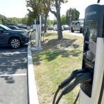 A set of electric vehicle charging stations stand ready for public use in the parking lot of the Clallam County Courthouse in Port Angeles. (Keith Thorpe/Peninsula Daily News)