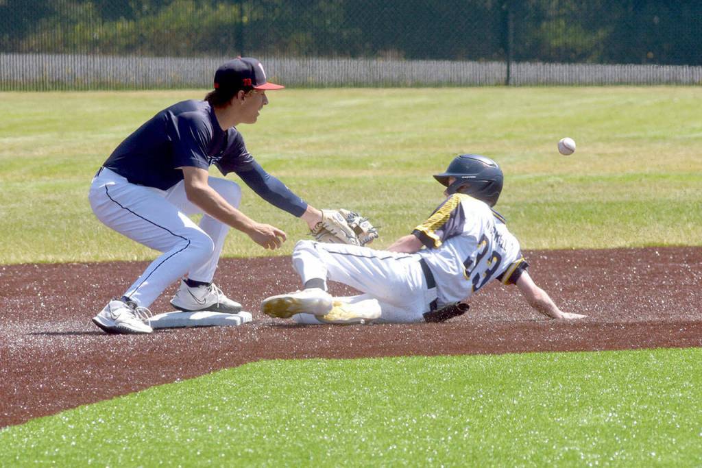 KEITH THORPE/PENINSULA DAILY NEWS Wilder Jr.. second baseman Rylan Dunn sees the ball get past him as Sting AAAs Jasper Worrall slides into second on Thursday at Volunteer Field in Port Angeles.