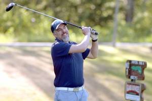 KEITH THORPE/PENINSULA DAILY NEWS
Tommy Post, part of a group basing at Sunland, tees off on the first hole of Peninsula Golf Club during Friday's session of the Clallam County Amateur Championship tournament.