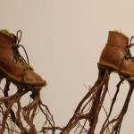 Artist Jeanne K Simmons 2023 piece, Boots with Roots, is on display at Jefferson County Historical Society Museum of Art + History. (Elijah Sussman/Peninsula Daily News)