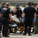 Law enforcement officers arrest a man who allegedly led a high-speed chase from Port Angeles to Sequim along U.S. Highway 101 on Wednesday. (Michael Dashiell/Olympic Peninsula News Group)