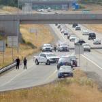 Law enforcement vehicles block the Sequim Avenue exit from U.S. Highway 101 in the aftermath of a high-speed chase from Port Angeles to Sequim. (Keith Thorpe/Peninsula Daily News)