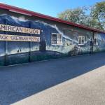Remember Me, the large-scale mural on the American Legion-Jack Grennan Post 62 hall, was unveiled at a public event on Saturday. (Melissa Klein)