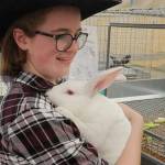 Haley Petty, 17, of Agnew earned reserve market champion with Roast the rabbit at the Clallam County Junior Livestock Auction at the Sequim Prairie Grange in 2022. This years auction is set for Aug. 3. (Matthew Nash/Olympic Peninsula News Group)