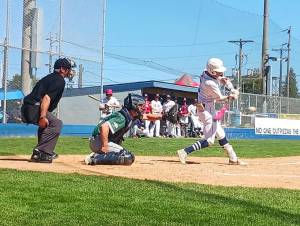 Wilder Senior's Bryant Laboy hits against Lakeside Legion at Civic Field in Port Angeles on Saturday. (Pierre LaBossiere/Peninsula Daily News)
