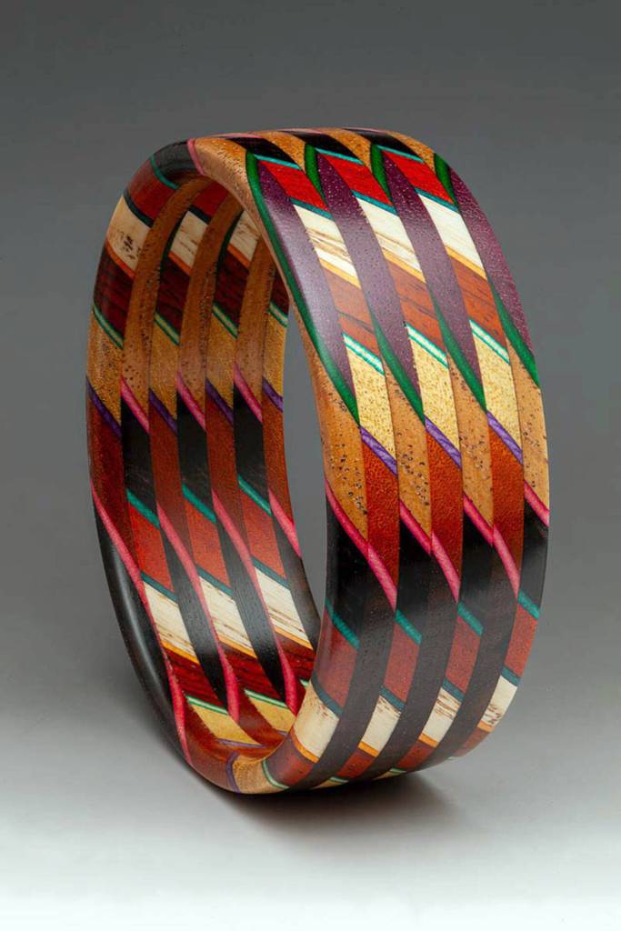 The art to be featured at various locations during the First Saturday Art Walk includes woodworks by Martha Collins.