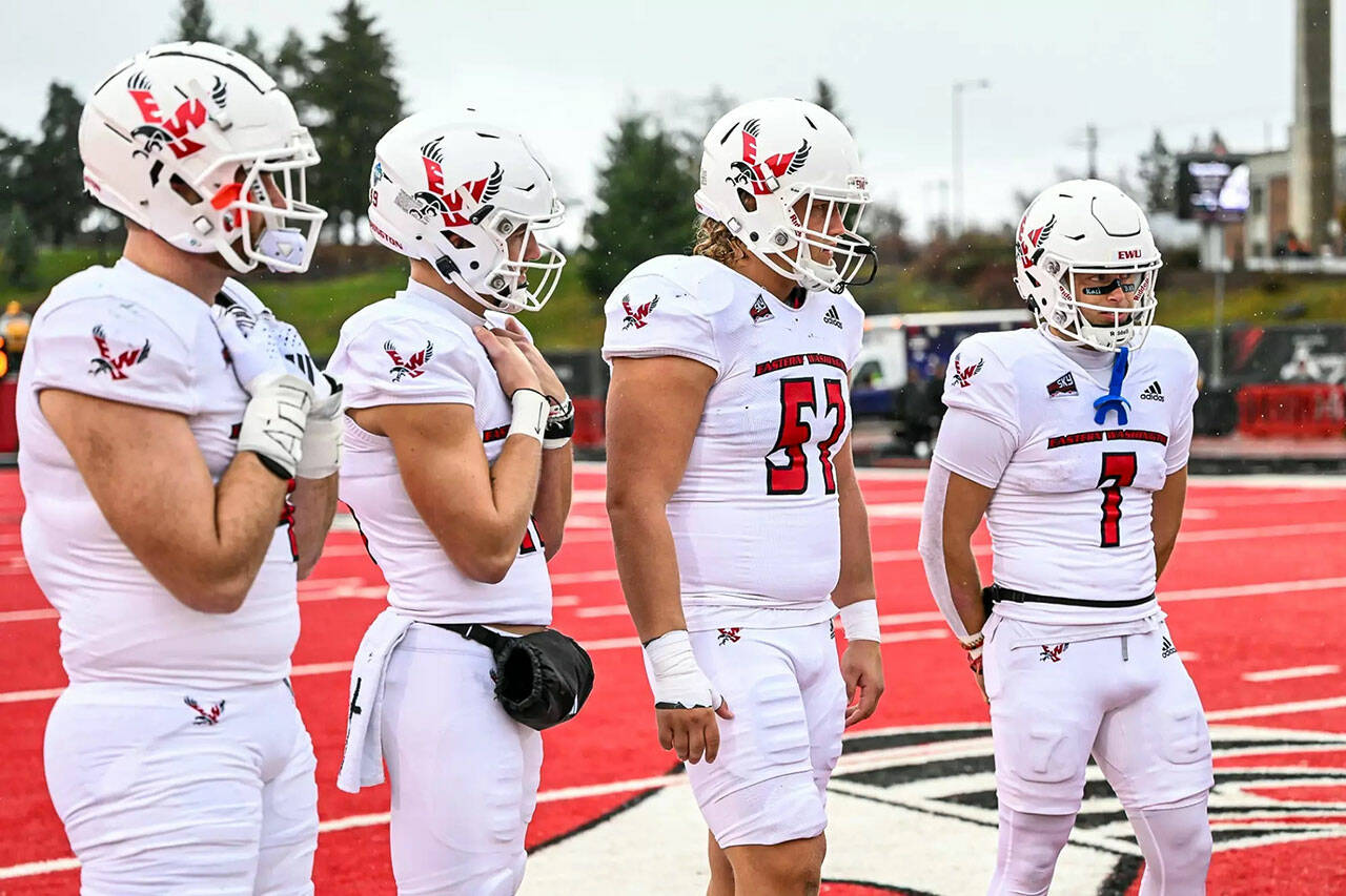 Courtesy Eastern Washington Athletics Forks Luke Dahlgren, second from right, shown during a pregame coin flip during the 2023 season, has been selected as a captain for the second straight season for the Eastern Washington football team.