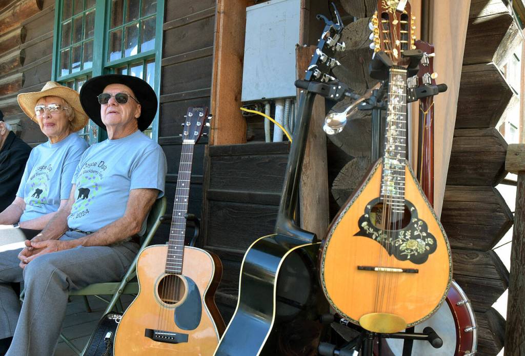 Longtime Joyce Daze music providers Rosalie and Dave Secord wait for their turn on the stage on Saturday in Joyce. (Keith Thorpe/Peninsula Daily News)