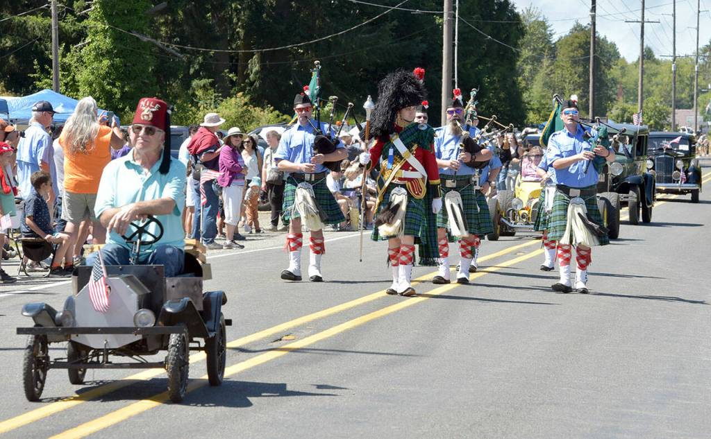 Shriners, bagpipers and antique cars make their way down the Joyce Days parade route on Saturday. (Keith Thorpe/Peninsula Daily News)
