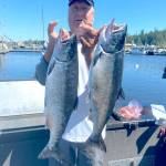 Yakima angler Terry Day brought home these two hatchery coho Sunday while fishing in the waters of Marine Area 4 (Neah Bay).