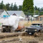 James Baker of Longview stalls out his nitrous oxide charged 76 Blazer in a race against Ethan Newman of Quilcene in his Chevy 350-powered 1980 Toyota pickup during the mud drags at the Jefferson County Fairgrounds on Sunday. (Steve Mullensky/for Peninsula Daily News)