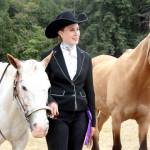 Paige Horseman poses with her horse, Candy, at the Clallam County Fair on Friday. (Dave Logan/For Peninsula Daily News)