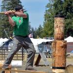 KEITH THORPE/PENINSULA DAILY NEWS
Patrick Mahoney of Raymond takes aim at his wooden target during the springboard chop competition during Saturday's logging show in the grandstands arena of the Clallam County Fair in Port Angeles. Mahoney went on to win the event against two other competetors.