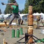 KEITH THORPE/PENINSULA DAILY NEWS Patrick Mahoney of Raymond takes aim at his wooden target during the springboard chop competition during Saturdays logging show in the grandstands arena of the Clallam County Fair in Port Angeles. Mahoney went on to win the event against two other competetors.