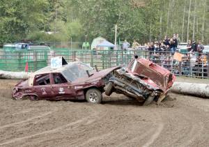 Ryan Petty, No. 95, crashes into Brandon Rutherford during the 2024 Demo Derby at the Clallam County Fair this weekend. (Dave Logan/for Peninsula Daily News)